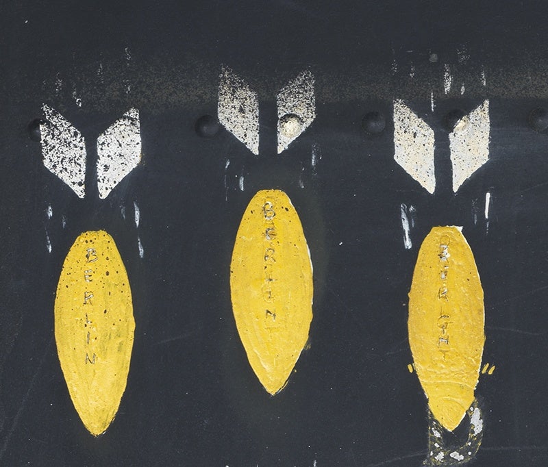 Yellow bombs painted on a WW2 bomber, at the Imperial War Museum in London