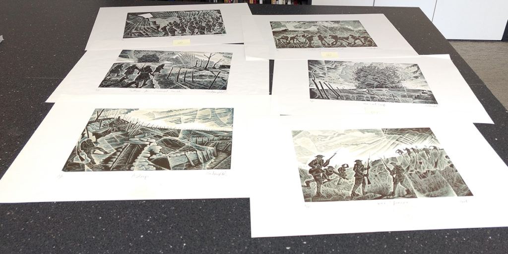 Finished proofs of Neil Bousfield's engravings at the Folio offices