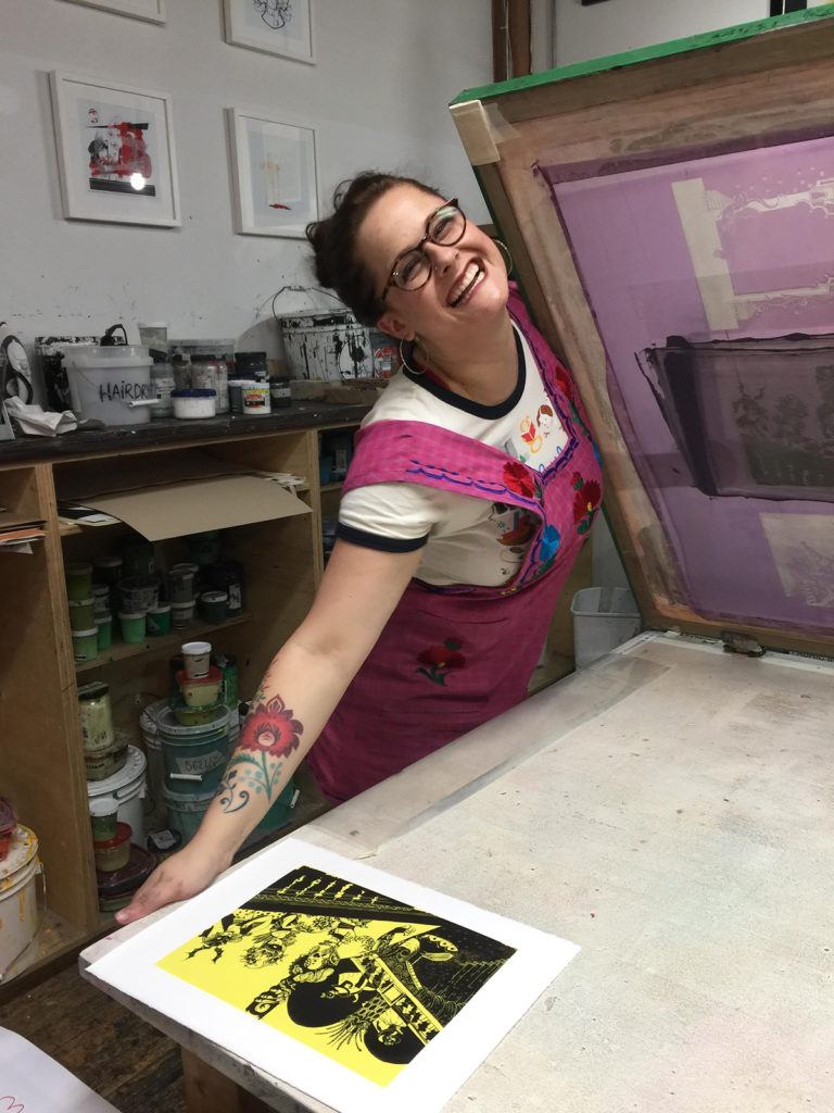 Artist Taylor Dolan screen-printing her work for the Folio edition of The Phantom of the Opera
