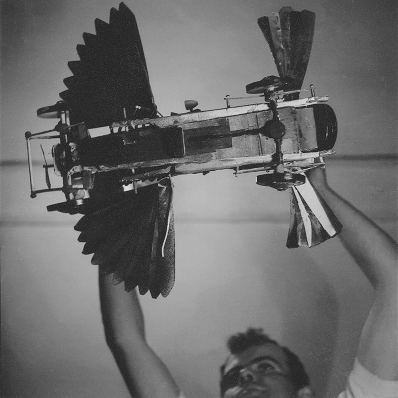 John Burningham holding aloft his handmade model of Chitty-Chitty-Bang-Bang (c .1963) John Burningham holding aloft his handmade model of Chitty-Chitty-Bang-Bang (c .1963)