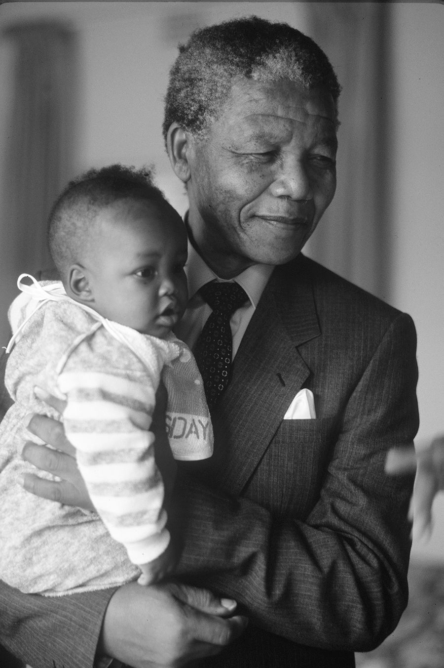 Mandela with his grandson, Bamatha. Photograph by Peter Magubane, 1990 Mandela with his grandson, Bamatha. Photograph by Peter Magubane, 1990